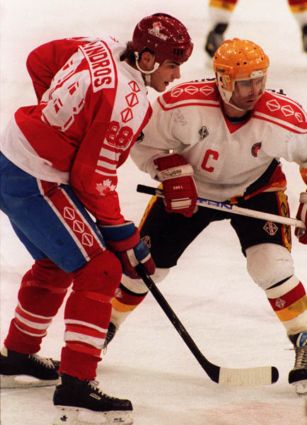 Canada's Eric Lindros (left) competing in the hockey event against Germany at the 1992 Albertville Olympic winter Games. (CP PHOTO/COA/Scott Grant)