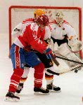 Canada's Eric Lindros (red & blue) competing in the hockey event against Germany at the 1992 Albertville Olympic winter Games. (CP PHOTO/COA/Scott Grant)