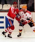 Canada's Adrien Plavsic (left) competing in the hockey event against Germany at the 1992 Albertville Olympic winter Games. (CP PHOTO/COA/Scott Grant)