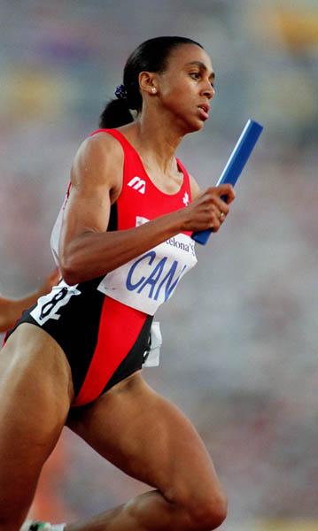 Canada's Charmaine Crooks competing in the 4x400m relay event at the 1992 Olympic games in Barcelona. (CP PHOTO/ COA/ Claus Andersen)