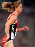Canada's Donalda Duprey competing in the 400m hurdles event at the 1992 Olympic games in Barcelona. (CP PHOTO/ COA/ Claus Andersen)