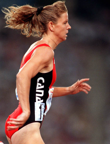 Canada's Donalda Duprey competing in the 400m hurdles event at the 1992 Olympic games in Barcelona. (CP PHOTO/ COA/ Claus Andersen)