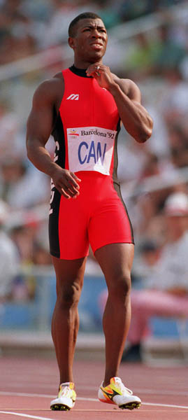 Canada's Glenroy Gilbert competing in the 4x100m relay event at the 1992 Olympic games in Barcelona. (CP PHOTO/ COA/ Claus Andersen)