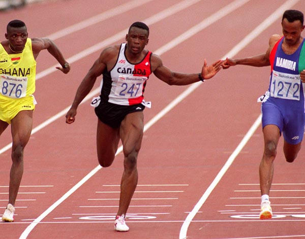 Canada's Bruny Surin (centre) competing in the 100m event at the 1992 Olympic games in Barcelona. (CP PHOTO/ COA/ Claus Andersen)