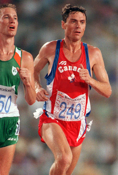 Canada's Paul Williams (right) competing in the 10,000m event at the 1992 Olympic games in Barcelona. (CP PHOTO/ COA/ Claus Andersen)