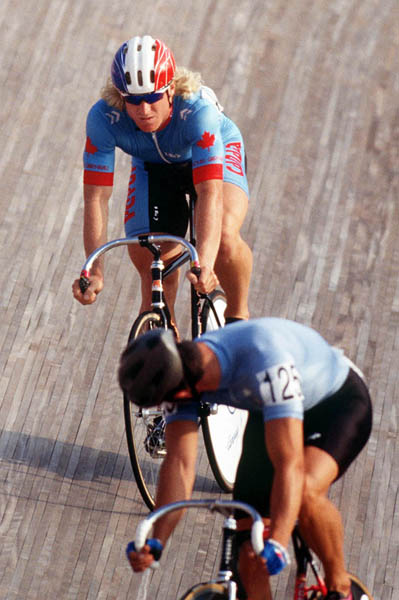 Canada's Curt Harnett (left) competing in the track event at the 1992 Olympic games in Barcelona. (CP PHOTO/ COA/ Claus Andersen)