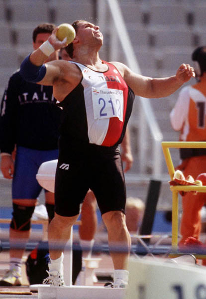 Canada's Peter Dajia competing in the shot put event at the 1992 Olympic games in Barcelona. (CP PHOTO/ COA/ Claus Andersen)