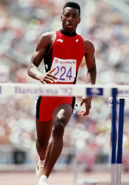Canada's Mark Jackson competing in the 400m hurdles event at the 1992 Olympic games in Barcelona. (CP PHOTO/ COA/ Claus Andersen)