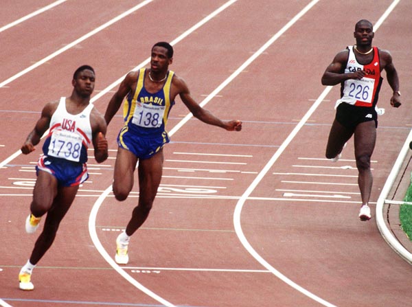 Canada's Ben Johnson (right) competing in the 100m event at the 1992 Olympic games in Barcelona. (CP PHOTO/ COA/ Claus Andersen)
