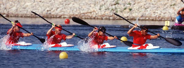 (Left to right) Canada's Klari MacAskill, Kevyn Stafford, Alison Herst and Caroline Brunet competing in the kayak event at the 1992 Olympic games in Barcelona. (CP PHOTO/ COA/ F.S. Grant)