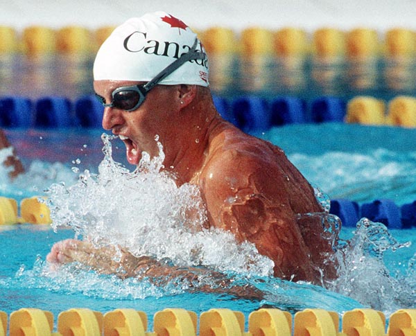 Canada's Jon Cleveland competing in the swimming event at the 1992 Olympic games in Barcelona. (CP PHOTO/ COA/Ted Grant)