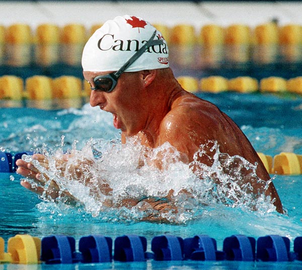 Canada's Jon Cleveland competing in the swimming event at the 1992 Olympic games in Barcelona. (CP PHOTO/ COA/Ted Grant)