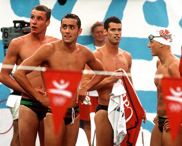(From left to right) Canada's Stephen Clarke, Marcel Gery, Mark Tewksbury and Jon Cleveland competing in the swimming event at the 1992 Olympic games in Barcelona. (CP PHOTO/ COA/Ted Grant)