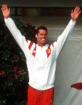 Canada's Mark Tewksbury celebrates his gold medal win in the men's swimming event at the 1992 Olympic games in Barcelona. (CP PHOTO/ COA/Ted Grant)
