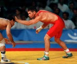 Canada's Robert Dawson (left) competing in the wrestling event at the 1992 Olympic games in Barcelona. (CP PHOTO/ COA/ Ted Grant)
