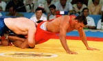 Canada's Jeff Thue (right) competing  in a wrestling event at the 1992 Olympic games in Barcelona. (CP PHOTO/ COA/ Ted Grant)