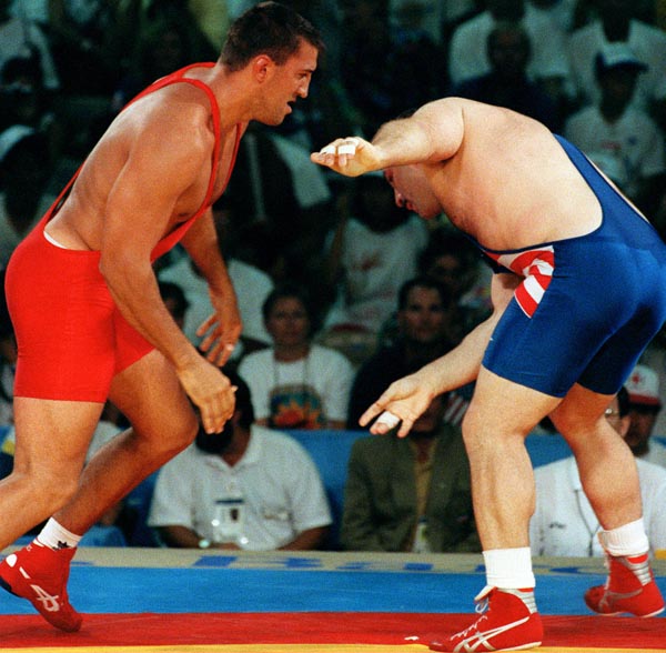 Canada's Jeff Thue (left) competing  in a wrestling event at the 1992 Olympic games in Barcelona. (CP PHOTO/ COA/ Ted Grant)