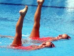 Canada's Penny and Vicky Vilagos, identical twins, competing in the synchronized swimming event at the 1992 Olympic games in Barcelona. (CP PHOTO/ COA/ Ted Grant)