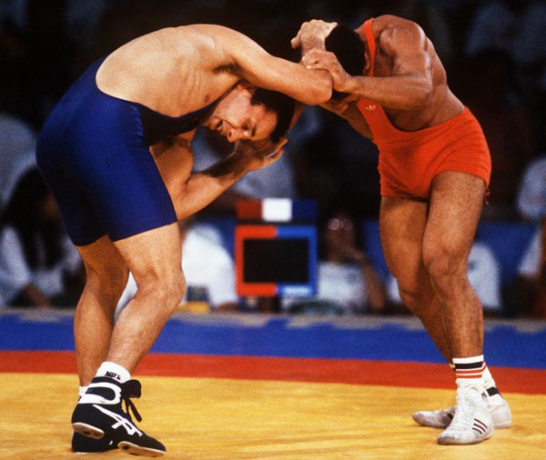 Canada's Chris Wilson (left) competing in the wrestling event at the 1992 Olympic games in Barcelona. (CP PHOTO/ COA/ Ted Grant)