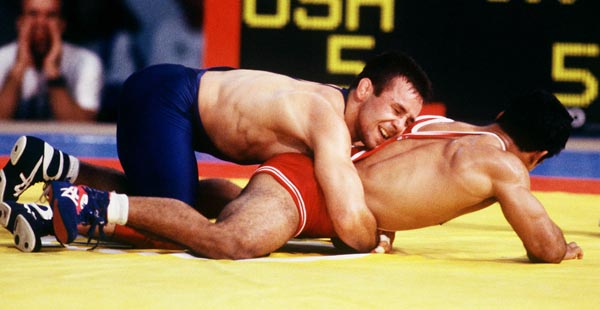 Canada's Chris Wilson (left) competing in the wrestling event at the 1992 Olympic games in Barcelona. (CP PHOTO/ COA/ Ted Grant)