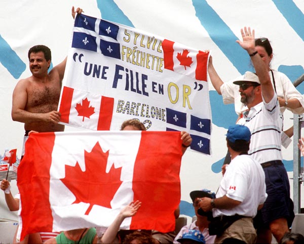 Canadian fan's at the synchronized swimming event during 1992 Olympic games in Barcelona. (CP PHOTO/ COA/ Claus Andersen)