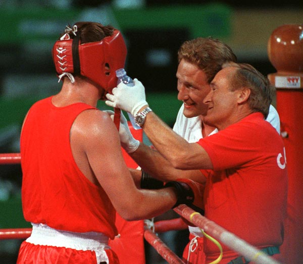 Canada's Dale Brown (left) with his coach Tylor Gordon (right) competing in the boxing event at the 1992 Olympic games in Barcelona. (CP PHOTO/ COA/ F.S.Grant)