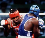 Canada's Kirk Johnson (left) competing in the boxing event at the 1992 Olympic games in Barcelona. (CP PHOTO/ COA/ F.S.Grant)