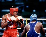 Canada's Kirk Johnson (left) competing in the boxing event at the 1992 Olympic games in Barcelona. (CP PHOTO/ COA/ F.S.Grant)