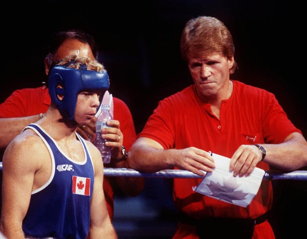 Canada's Mark Leduc (blue) competing in the boxing event at the 1992 Olympic games in Barcelona. (CP PHOTO/ COA/ F.S.Grant)