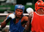 Canada's Chris Johnson (right) competing in the boxing event at the 1992 Olympic games in Barcelona. (CP PHOTO/ COA/ F.S.Grant)