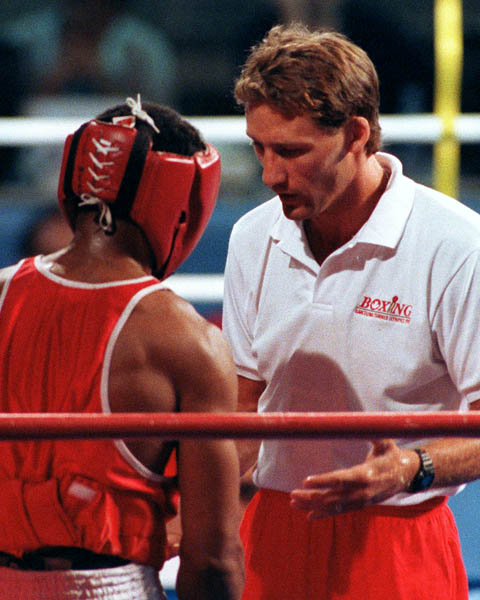 Canada's Raymond Downey (left) and Coach Wayne Gordon competing in the boxing event at the 1992 Olympic games in Barcelona. (CP PHOTO/ COA/ F.S.Grant)