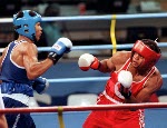 Canada's Raymond Downey (right) competing in the boxing event at the 1992 Olympic games in Barcelona. (CP PHOTO/ COA/ F.S.Grant)