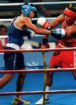 Canada's Mark Leduc celebrates the silver medal he won in the boxing event at the 1992 Olympic games in Barcelona. (CP PHOTO/ COA/ F.S.Grant)