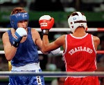 Canada's Mike Strange (blue) competing in the boxing event at the 1992 Olympic games in Barcelona. (CP PHOTO/ COA/ F.S.Grant)
