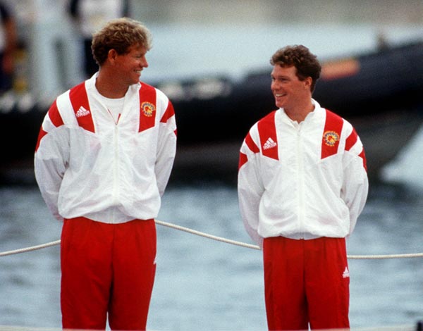 Canada's Eric Jesperson (left) and Ross MacDonald  celebrate the bronze medal they won in the yachting event at the 1992 Olympic games in Barcelona. (CP PHOTO/ COA/ F.S.Grant)