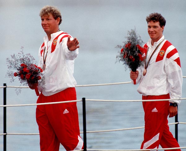Canada's Eric Jesperson (left) and Ross MacDonald celebrate the bronze medal they won in the yachting event at the 1992 Olympic games in Barcelona. (CP PHOTO/ COA/ F.S.Grant)
