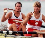 Canada's Marnie McBean (back) and Kathleen Heddle celebrate their gold medal win in the 2- rowing event at the 1992 Olympic games in Barcelona. (CP PHOTO/ COA/Ted Grant)