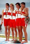 Canada's women's 4- rowing team (from left) Shannon Barnes, Brenda Taylor, Jessica Monroe, Kay Worthington celebrate their gold medal win in the 4- rowing event at the 1992 Olympic games in Barcelona. (CP PHOTO/ COA/Ted Grant)