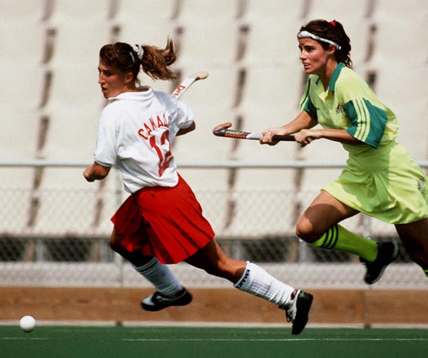 Canada's Laurelee Kopeck (left) competing in the field hockey event at the 1992 Olympic games in Barcelona. (CP PHOTO/ COA/Ted Grant)