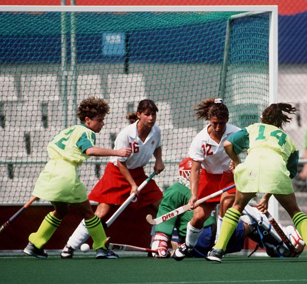 Canada's Sharon Creelman (#16) and Larelee Kopeck (#12) competing in the field hockey event at the 1992 Olympic games in Barcelona. (CP PHOTO/ COA/Claus Andersen)