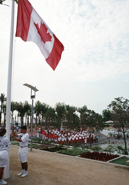 The Canadian flag is raised in honour of Canadian medal winning athletes at the 1992 Olympic games in Barcelona. (CP PHOTO/ COA/ Claus Andersen)