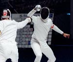 Canada's  Jean-Marc Chouinard (right) competing in the fencing event at the 1992 Olympic games in Barcelona. (CP PHOTO/ COA/ T.Grant)