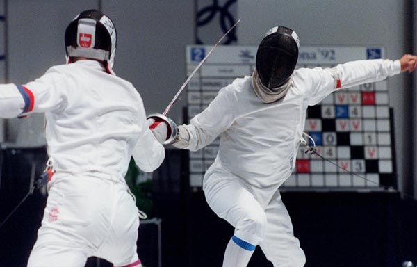Canada's Laurie Shong (right) competing in the fencing event at the 1992 Olympic games in Barcelona. (CP PHOTO/ COA/ T.Grant)