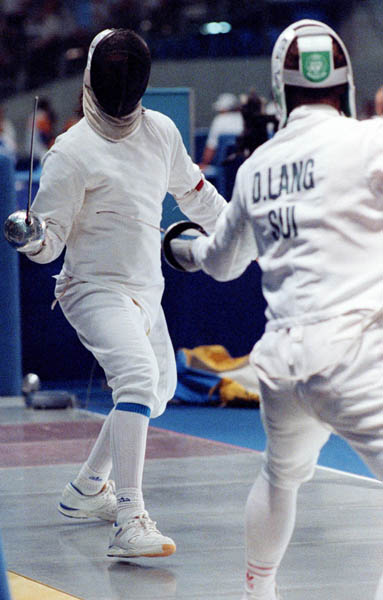 Canada's Laurie Shong (left) competing in the fencing event at the 1992 Olympic games in Barcelona. (CP PHOTO/ COA/ T.Grant)
