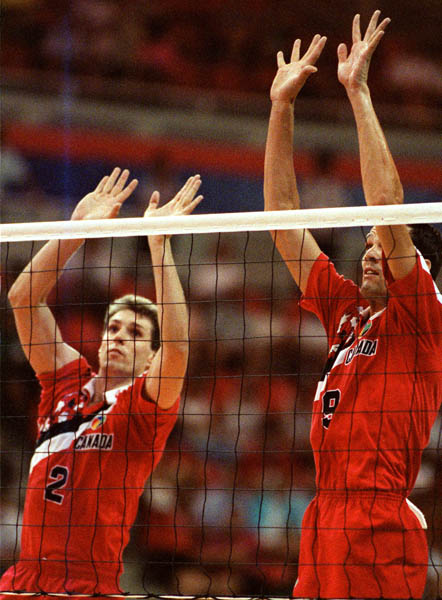 Canada's Bill Knight (left) and Marc Albert competing in the volleyball event at the 1992 Olympic games in Barcelona. (CP PHOTO/ COA/ Claus Andersen)