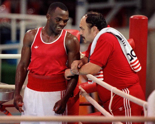 Canada's Marcus Egerton and and his coach Adrian Teodorescu compete in the boxing event at the 1988 Olympic games in Seoul. (CP PHOTO/ COA/ S.Grant)
