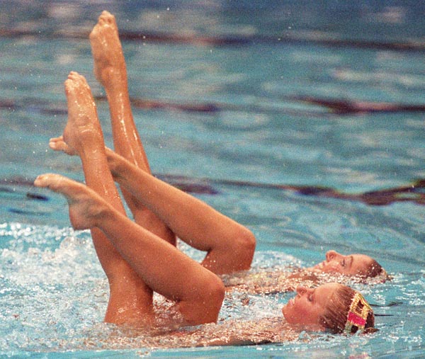 Canada's Carolyn Waldo (front) and Michelle Cameron compete in the synchronized swimming duet event at the 1988 Olympic games in Seoul. (CP PHOTO/ COA/ Ted Grant)