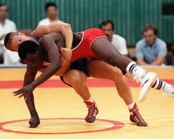 Canada's Gary Bohay (behind) competing in the wrestling event at the 1988 Olympic games in Seoul. (CP PHOTO/ COA/ Cromby McNeil)