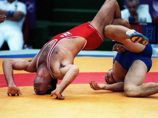 Canada's Chris Rinke (left) competing in the wrestling event at the 1988 Olympic games in Seoul. (CP PHOTO/ COA/ Cromby McNeil)