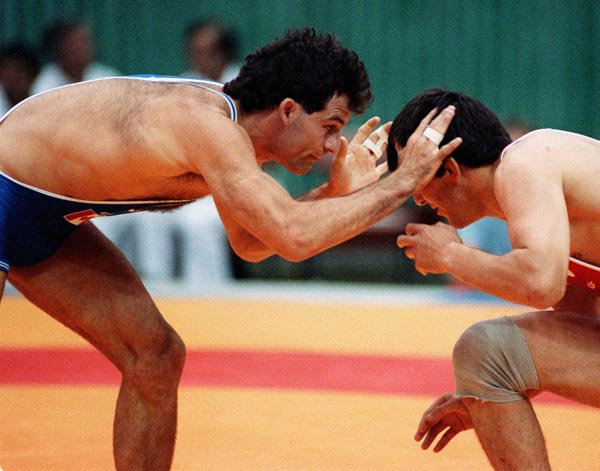 Canada's Chris Rinke (left) competing in the wrestling event at the 1988 Olympic games in Seoul. (CP PHOTO/ COA/ Cromby McNeil)